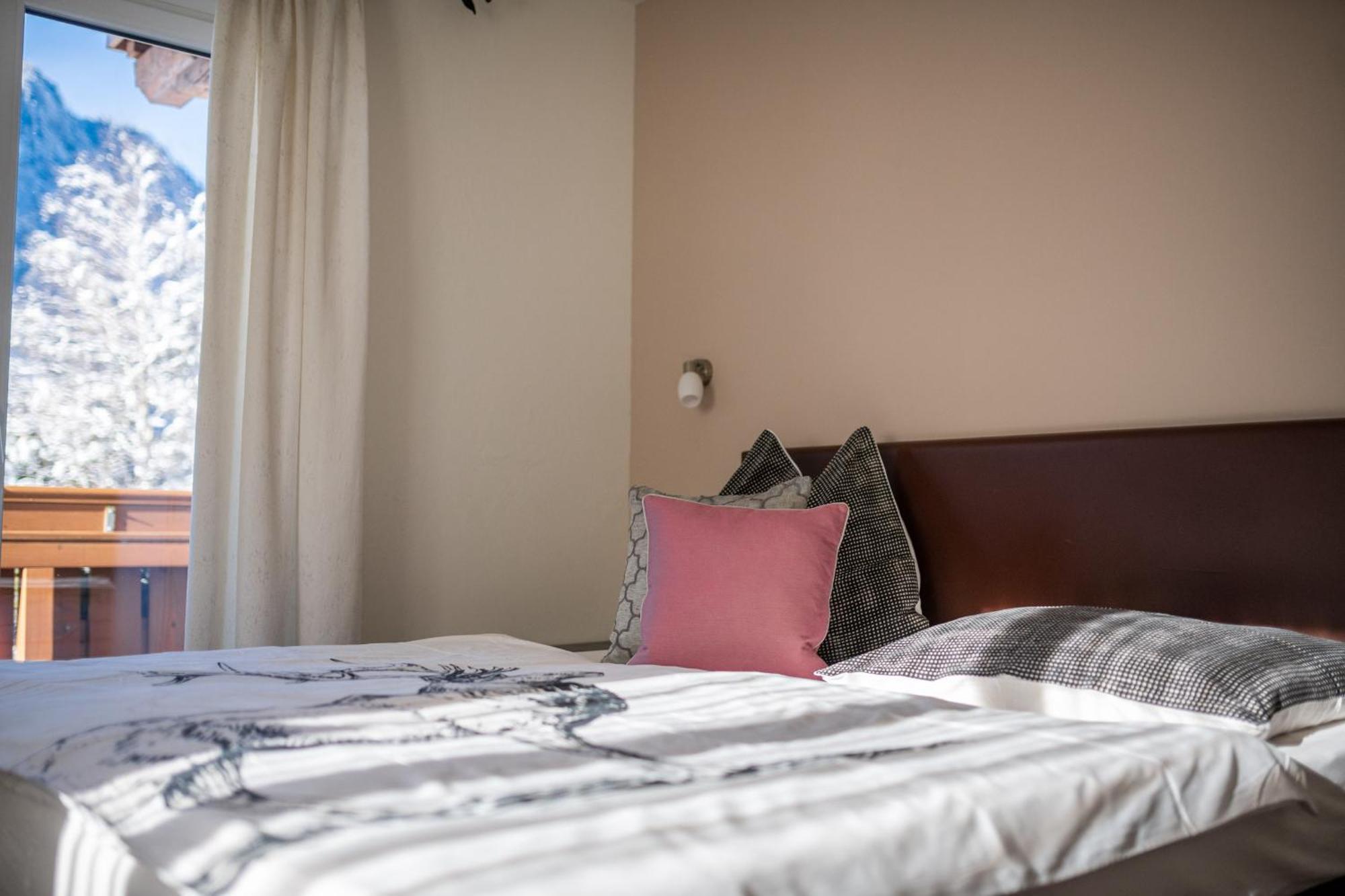 Aparthotel Der Jagdhof Sankt Johann im Pongau Pokoj fotografie